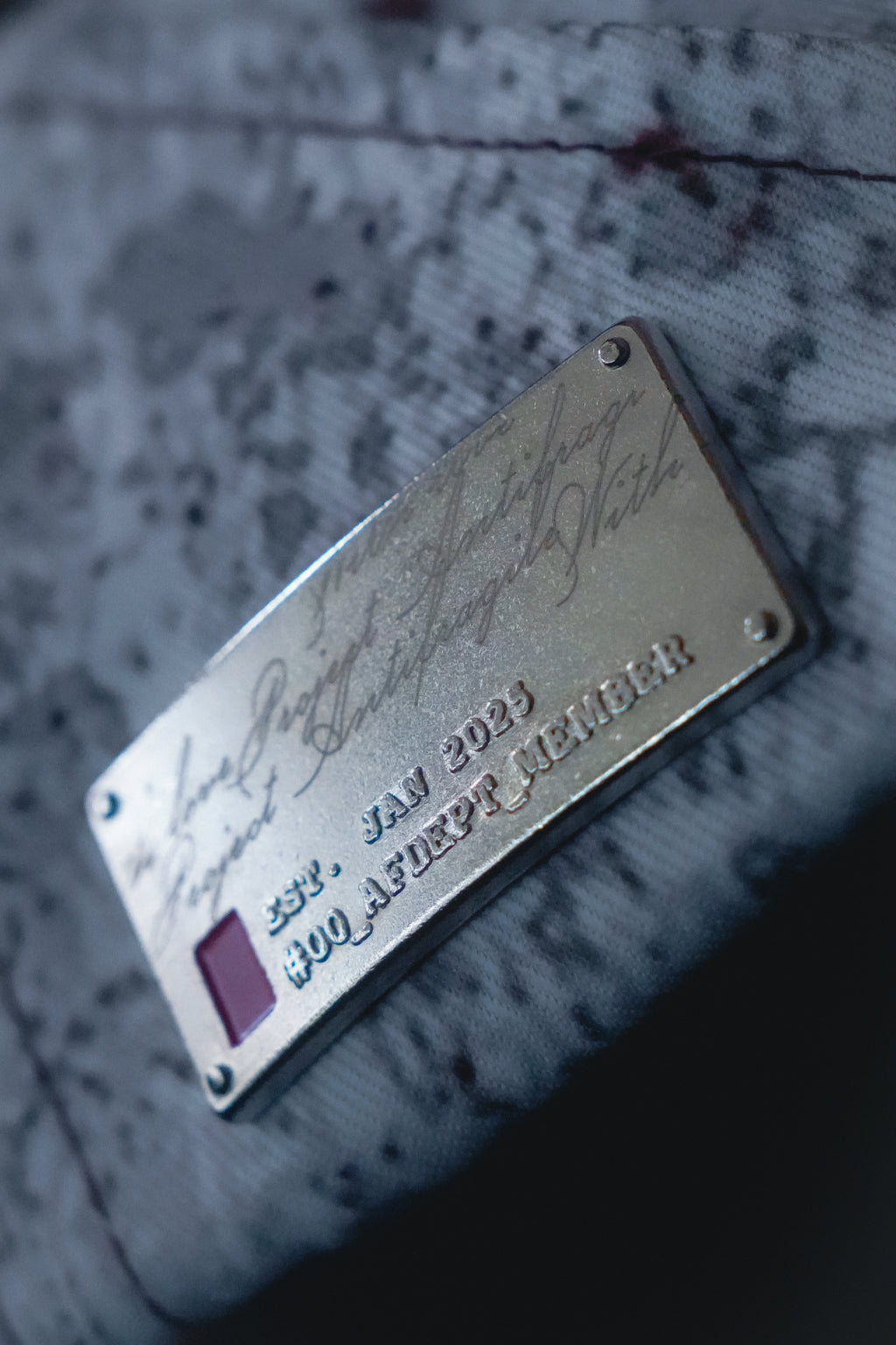 Closeup shot of the Antifragile Metal tag identifier.